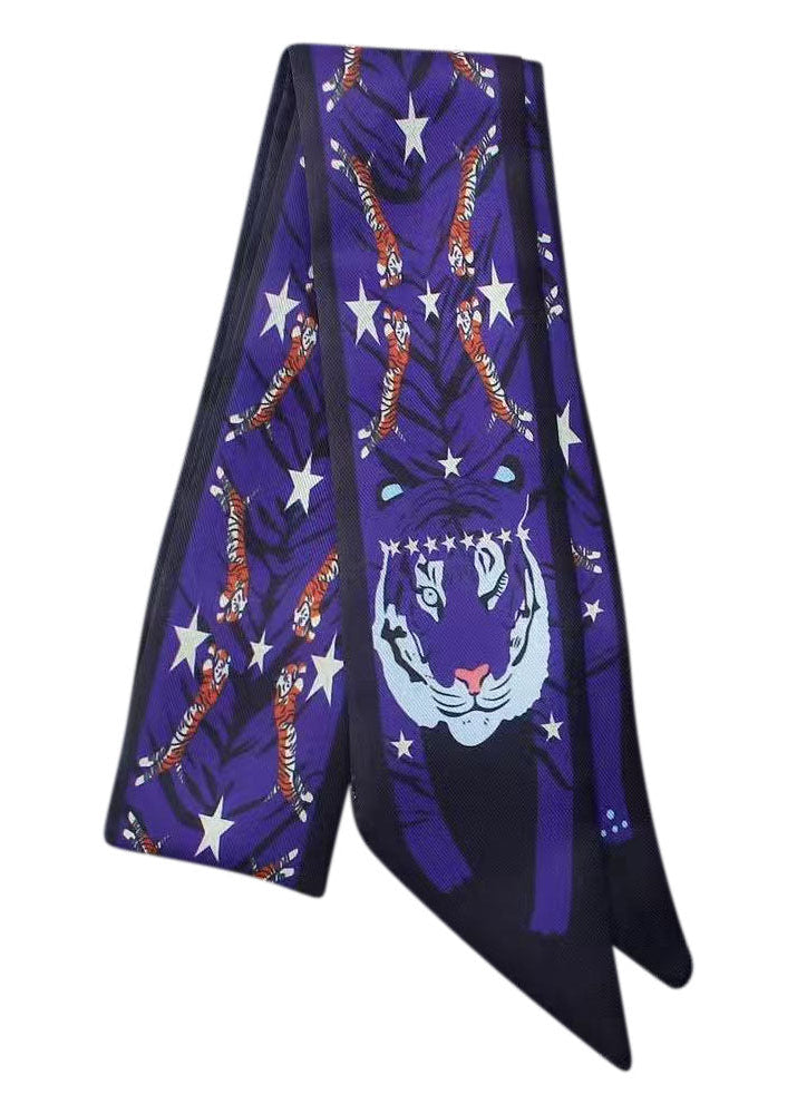 Purple scarf with tiger and star pattern on a white background