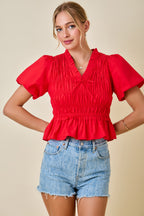 Smocked Peplum Top