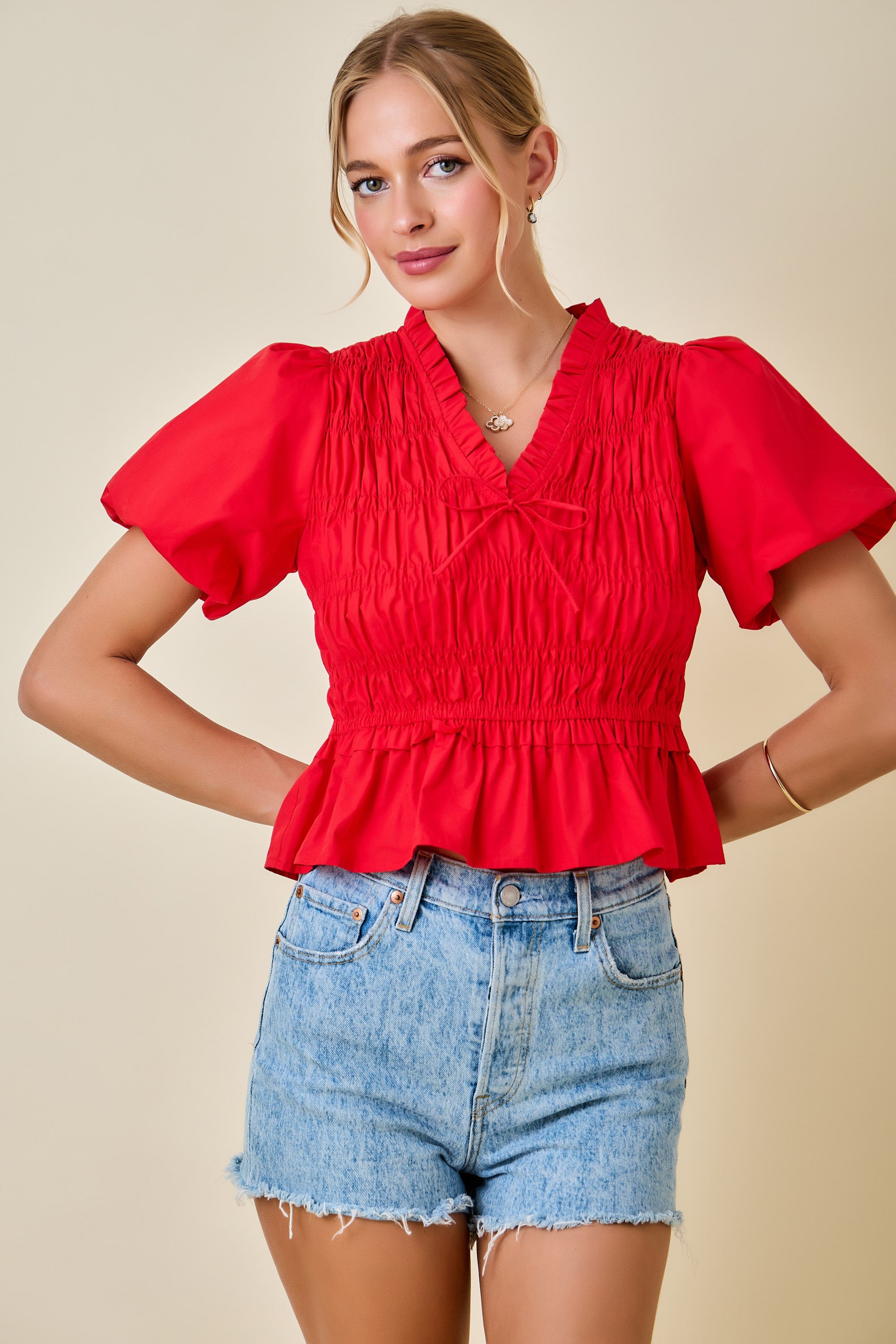 Smocked Peplum Top