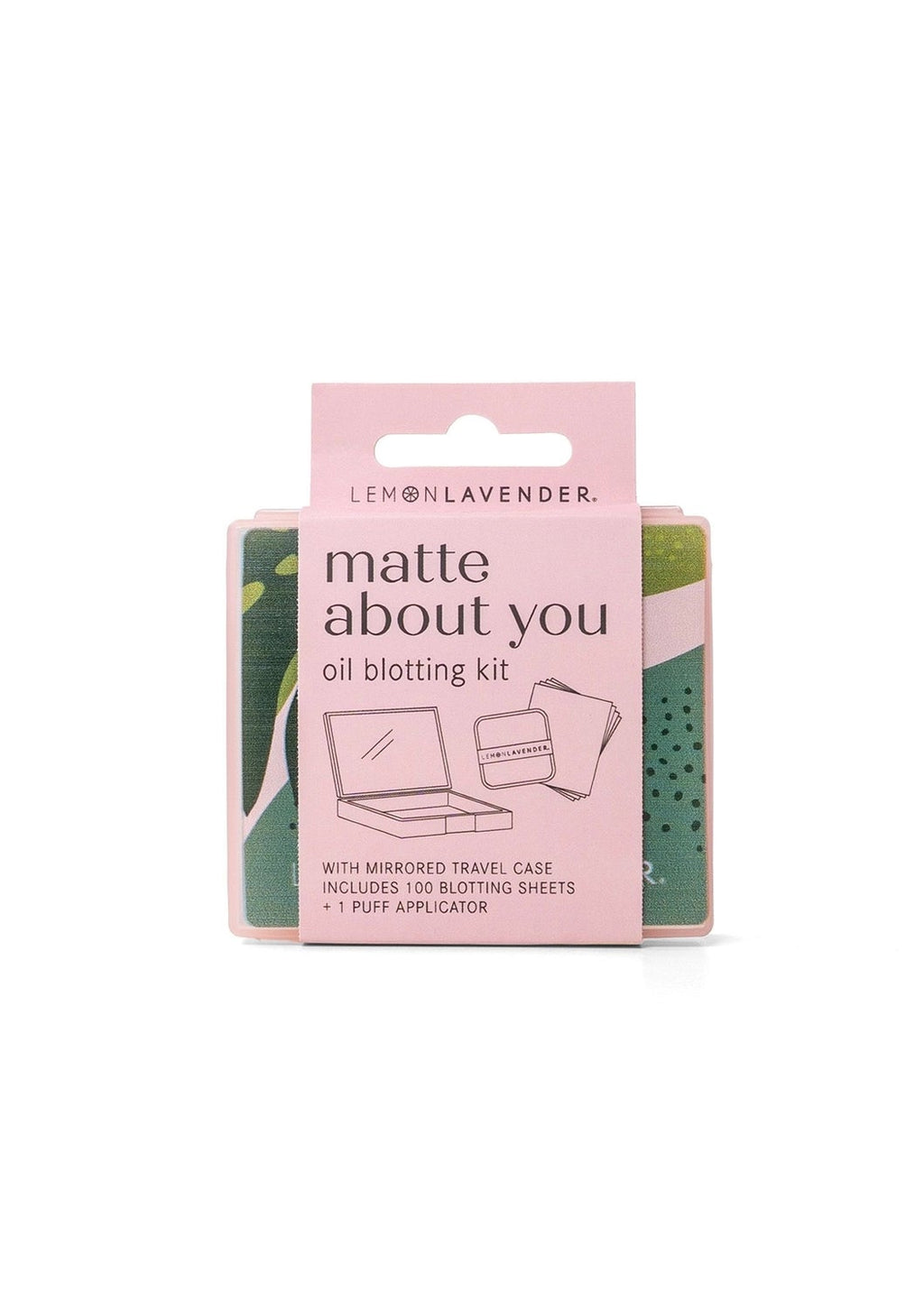 Oil blotting kit packaging with pink and green design on a white background