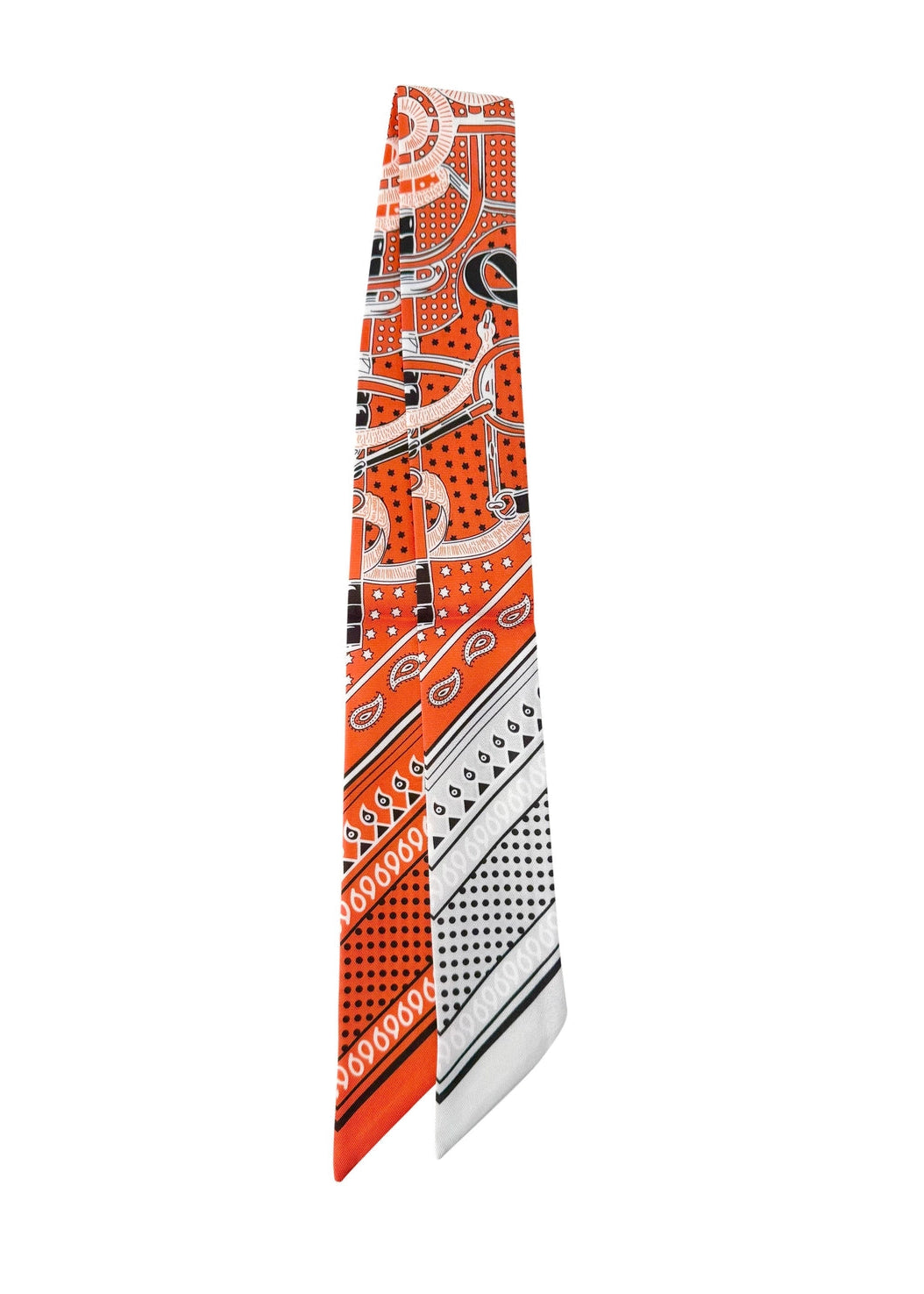Patterned tie with orange, black, and white design on a white background