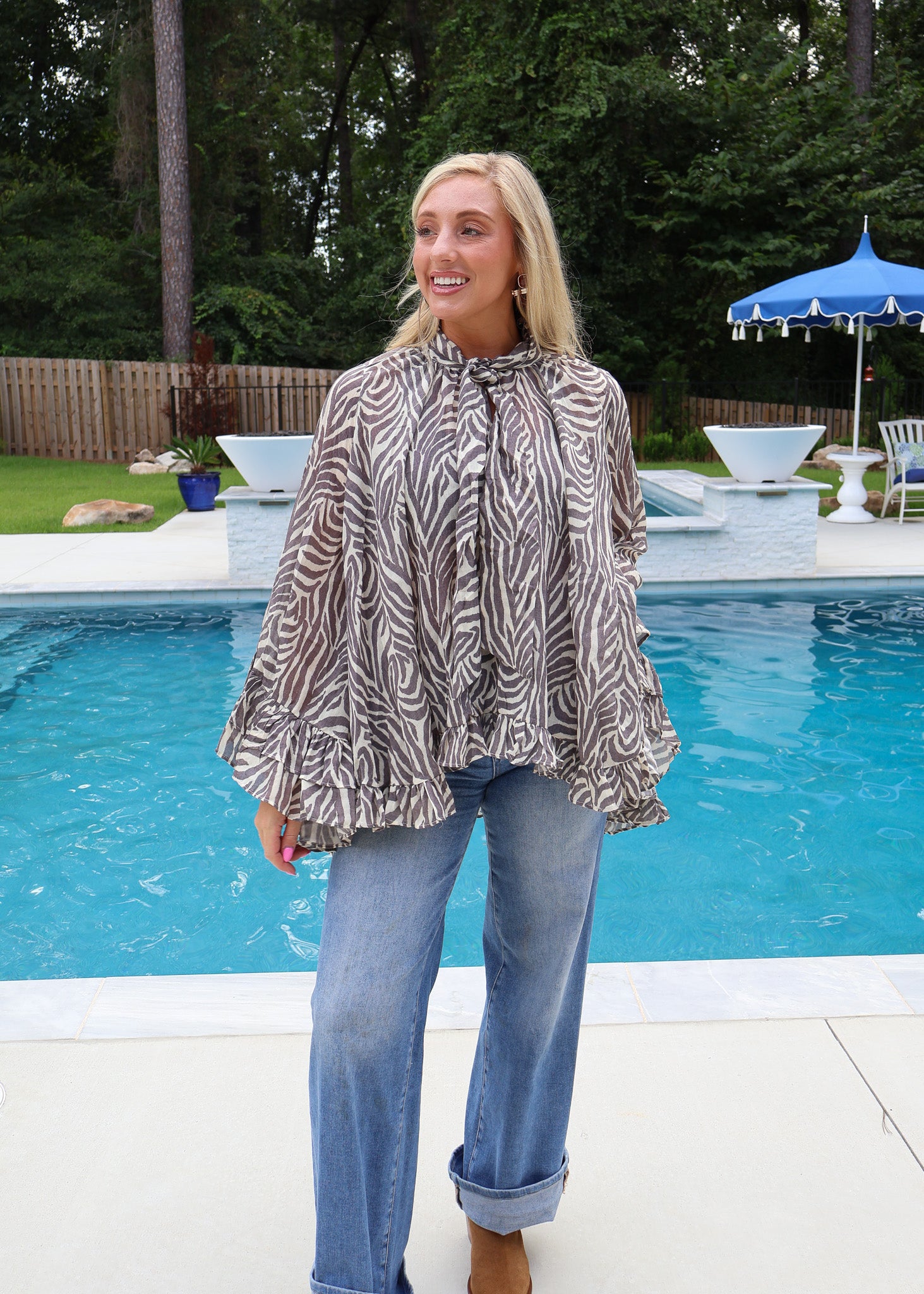 Sadie Zebra Ruffle Blouse