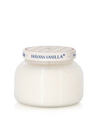 White candle jar with 'Havana Vanilla' label on a white background