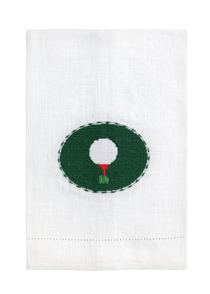 White towel with a green circle featuring a white golf ball and red and white flag on a white background