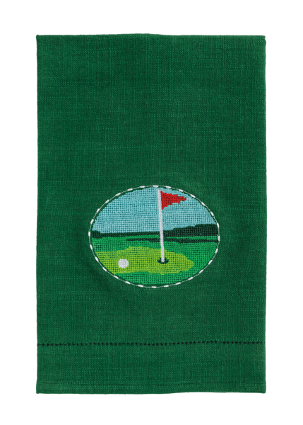 Green towel with a golf course design featuring a red flag and white ball on a white background