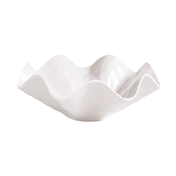White ceramic bowl with wavy design on a white background