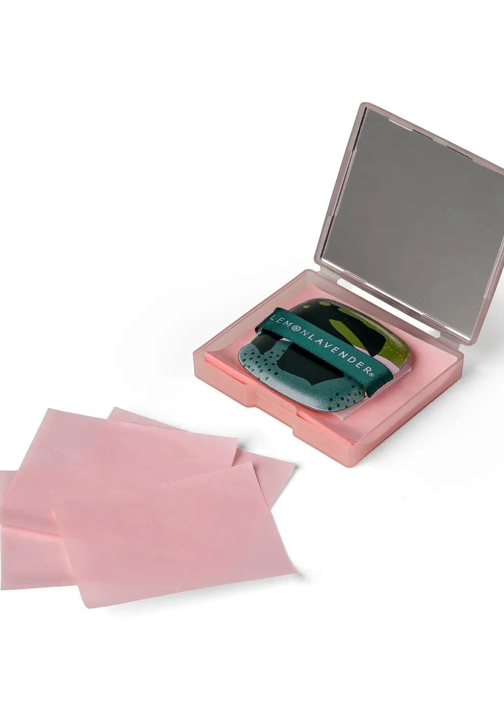 Compact mirror with pink pouches on a white background