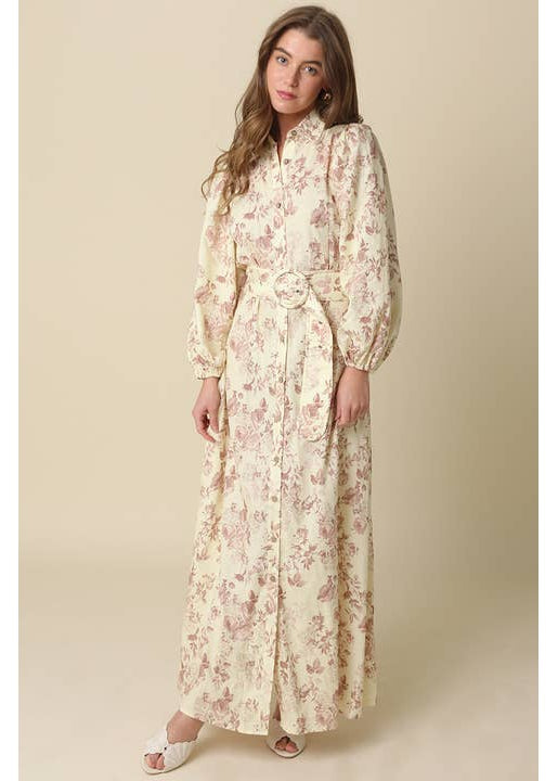 Woman wearing a floral dress against a beige background