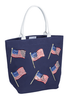 Navy tote bag with American flags on a white background