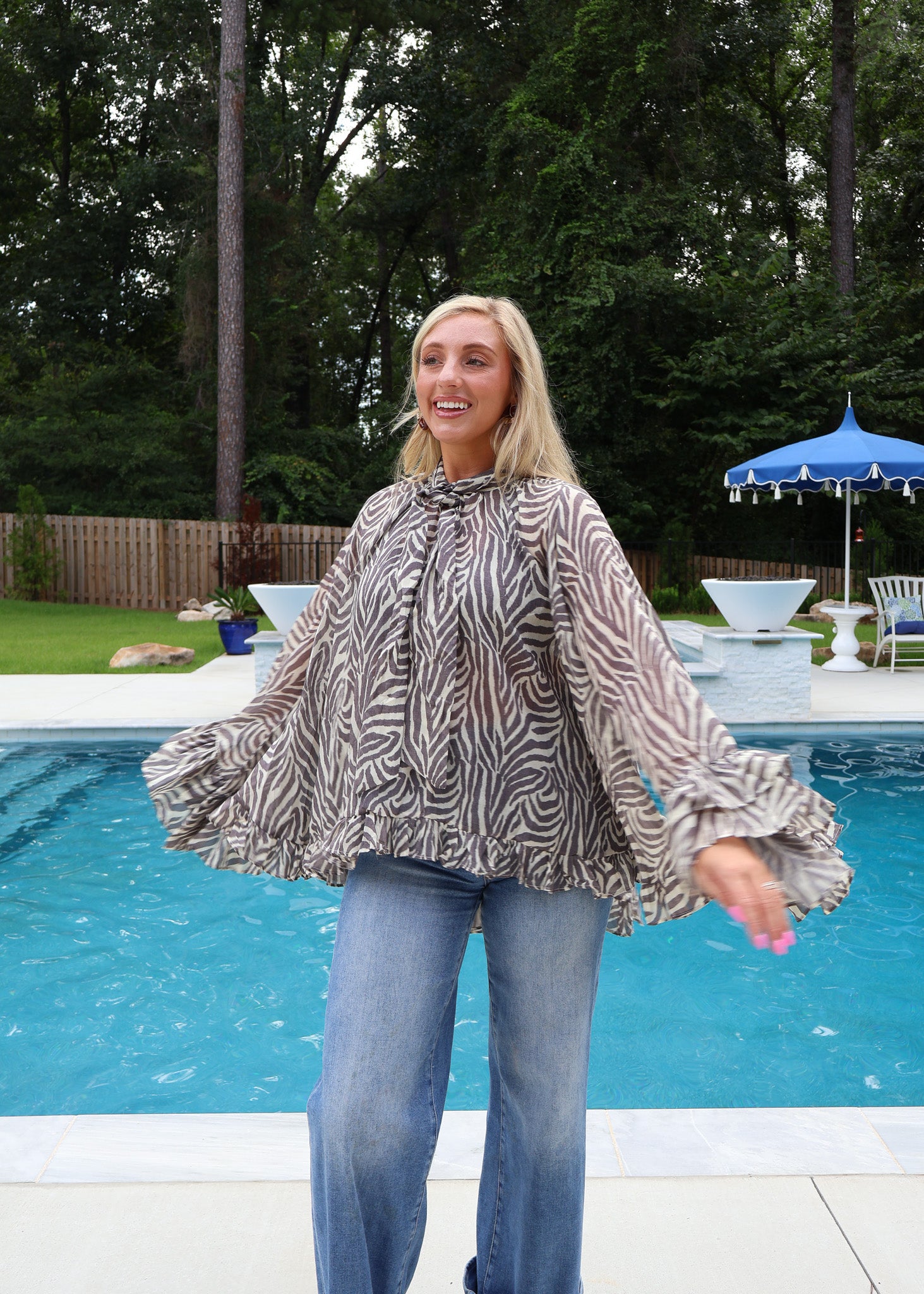 Sadie Zebra Ruffle Blouse