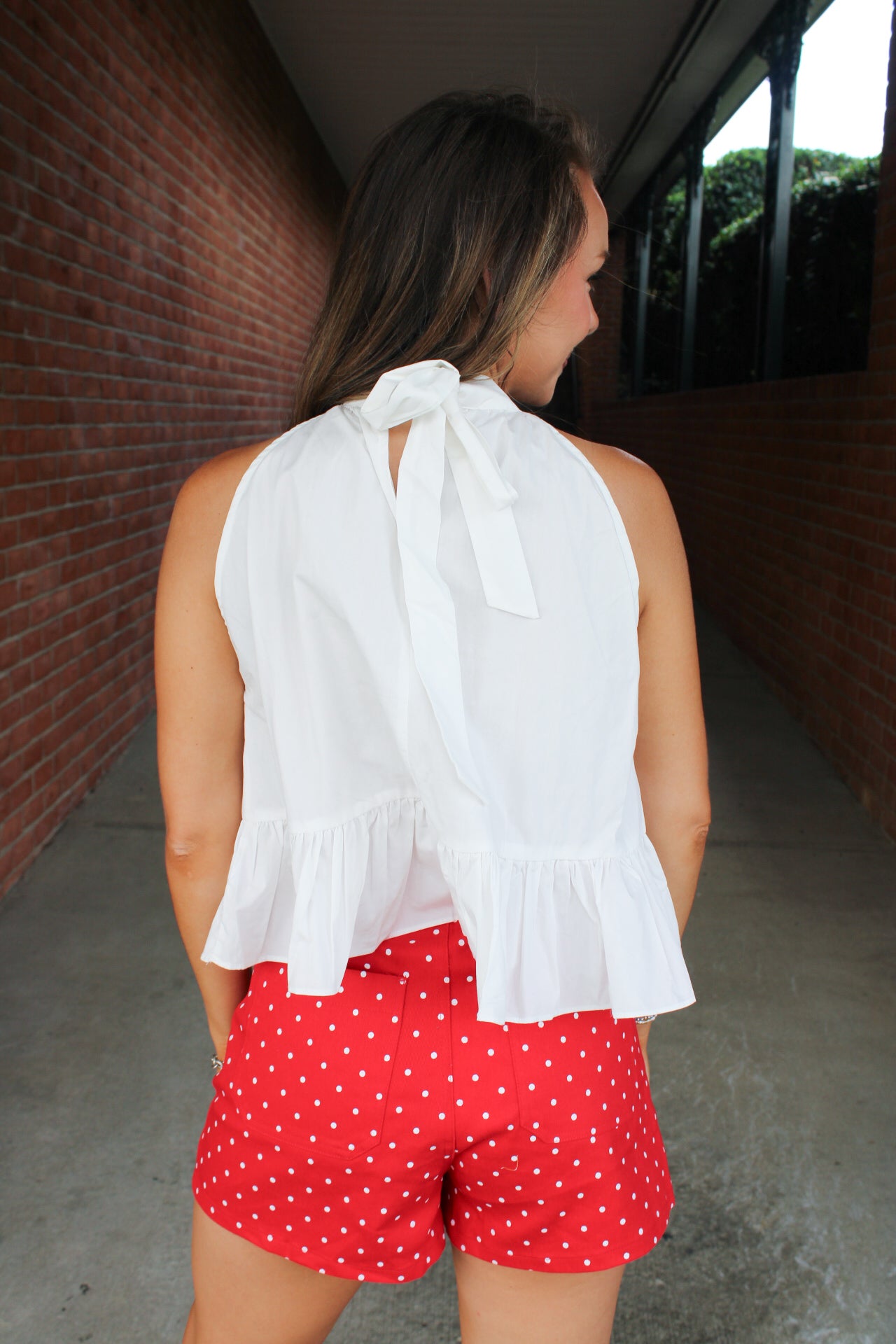 Natalie High Neck Ruffle Hem Top