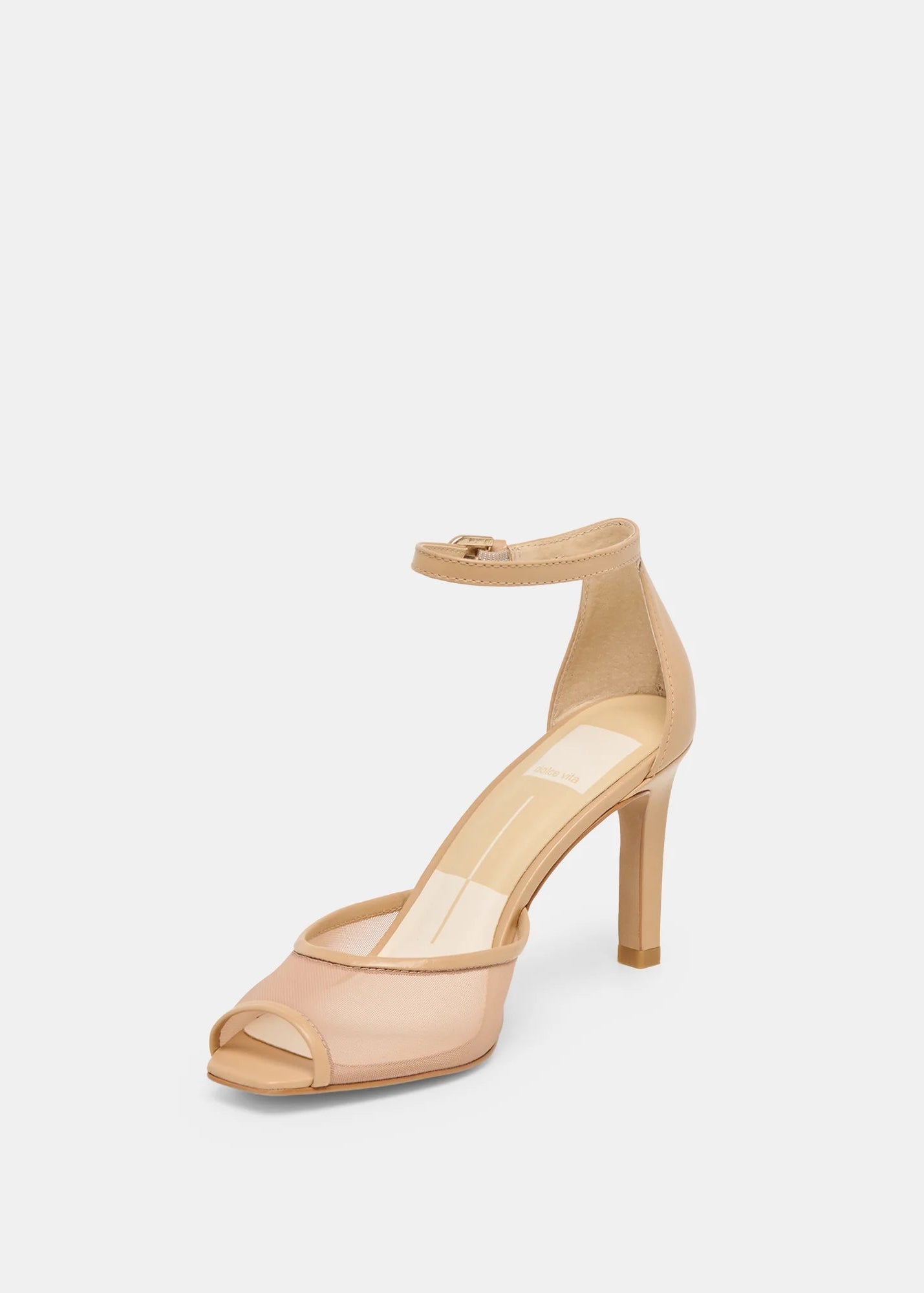 Beige high-heeled sandal with clear straps on a white background