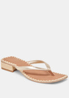 Beige sandal with jute trim on a white background