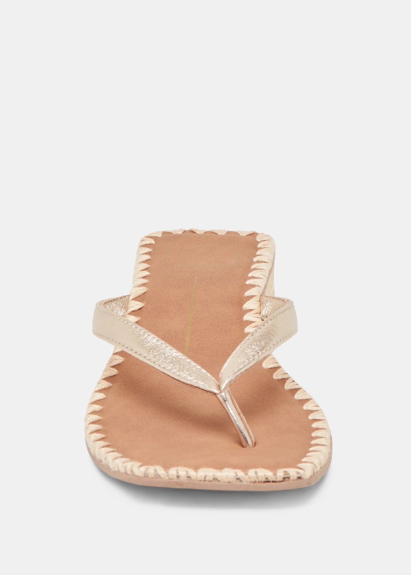 Beige sandal with raffia details on a white background