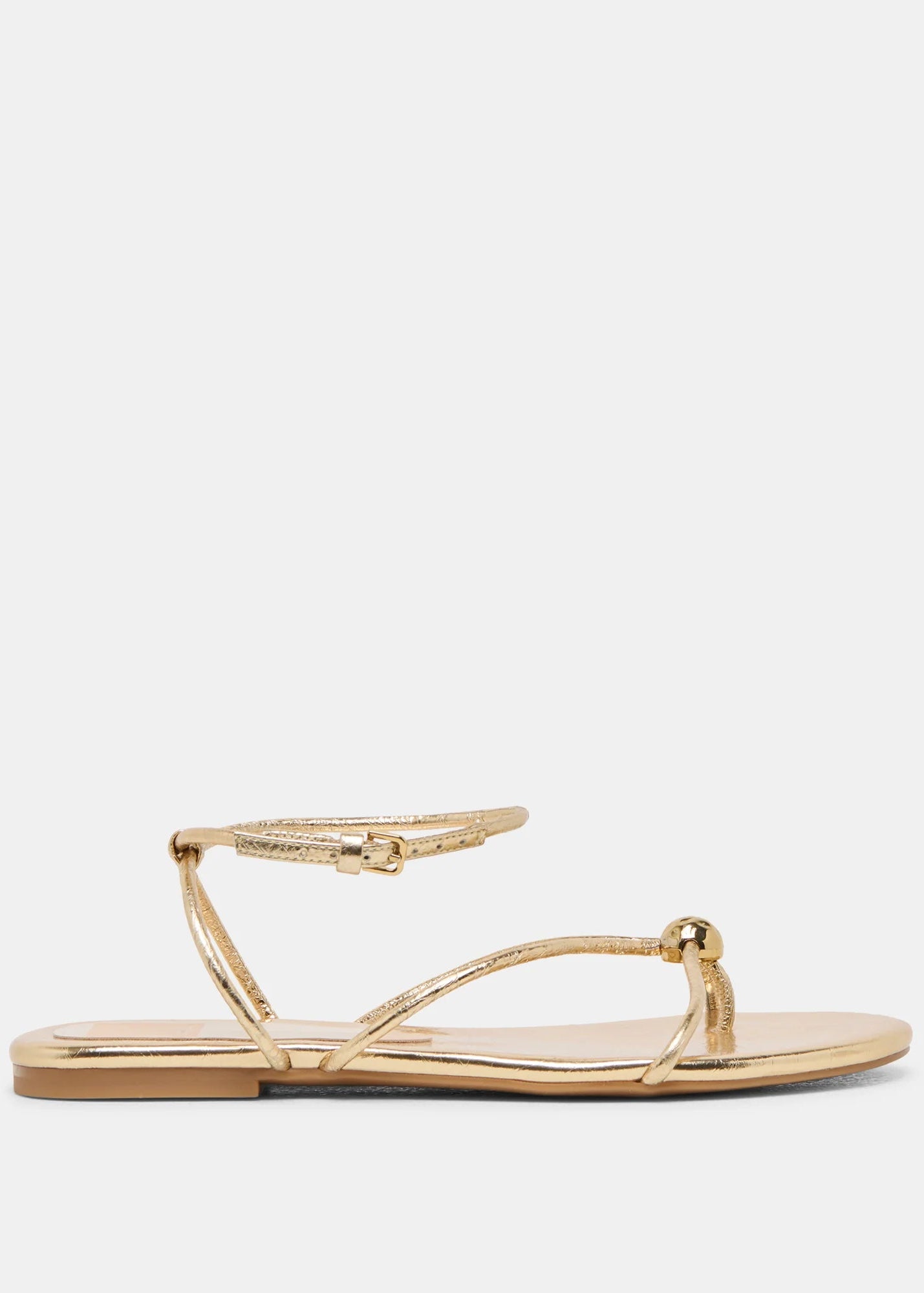 Gold sandal on a white background