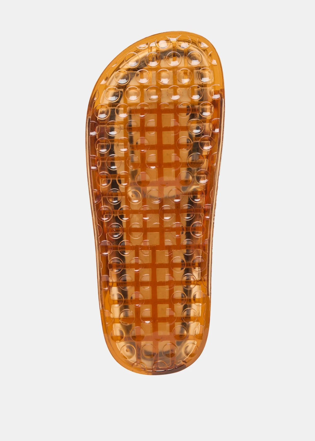 Transparent orange insole with textured surface on a light gray background