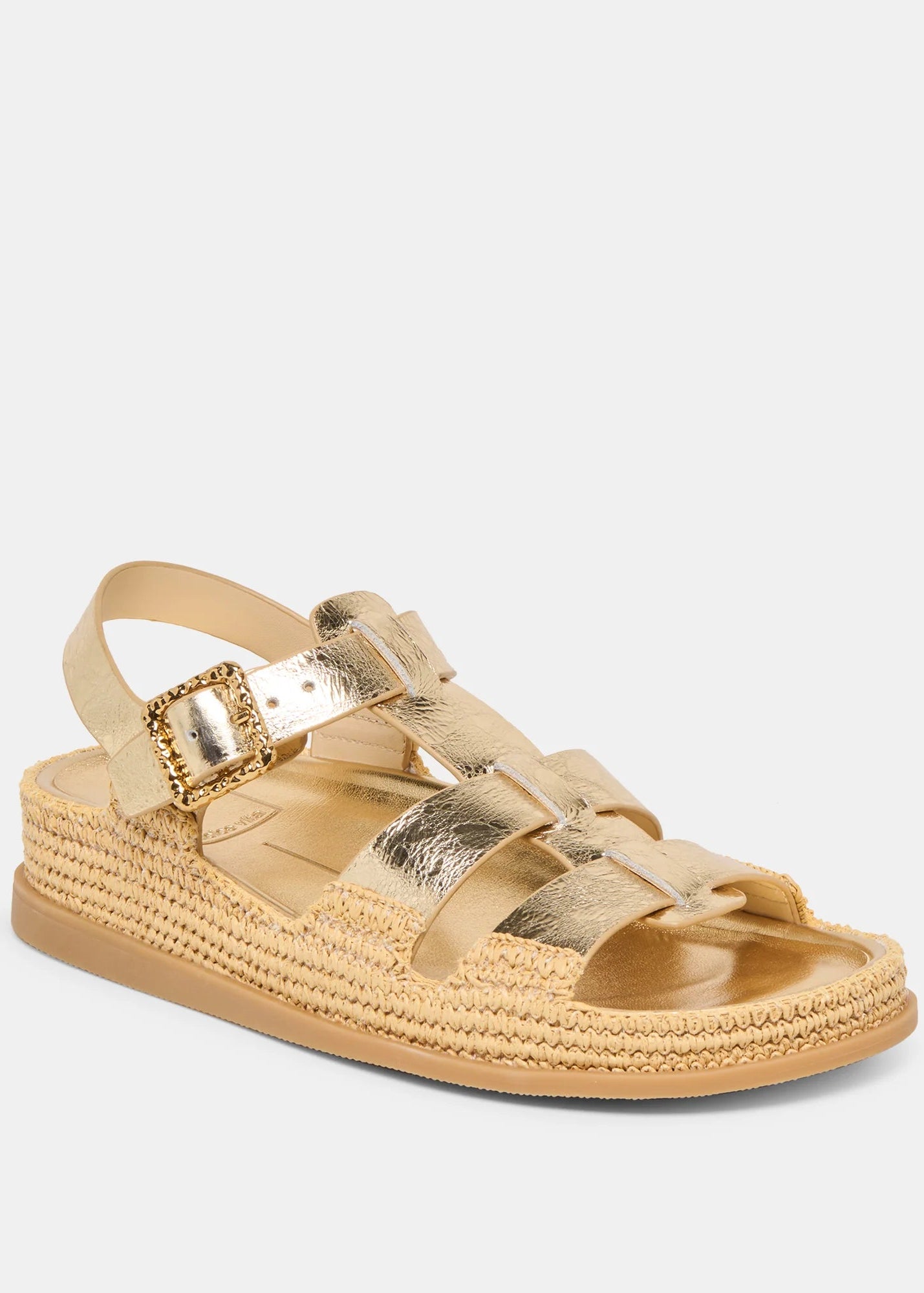 Gold sandal with a buckle on a light gray background