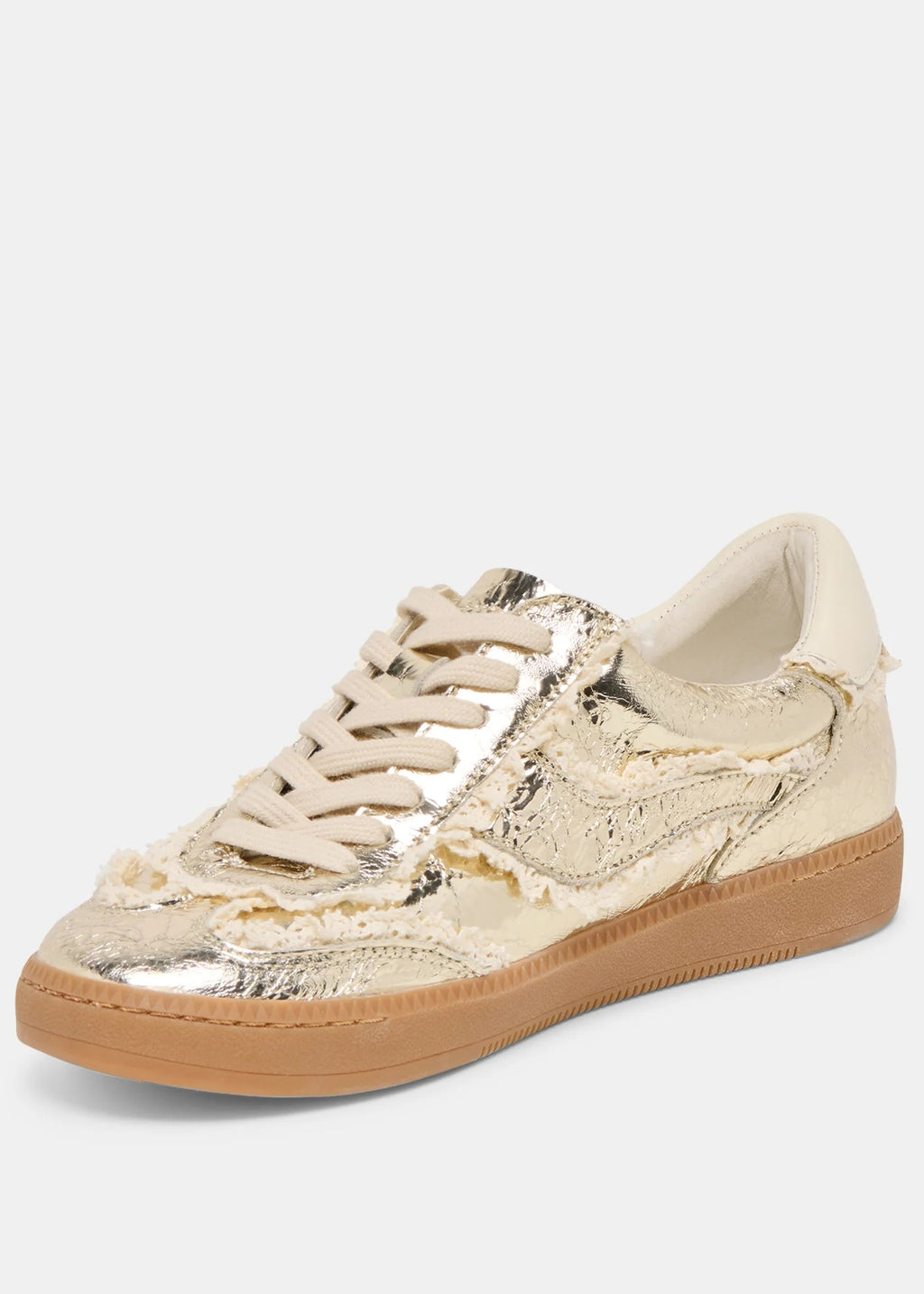 Gold and beige sneaker on a white background