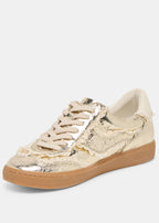 Gold and beige sneaker on a white background