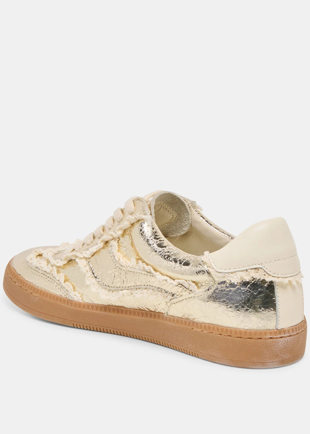 Beige sneaker with gold accents on a white background
