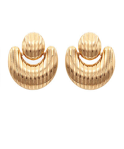 Pair of gold earrings on a white background