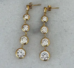 Polly gold crystal linear drop earrings by CHANSUTTPEARLS