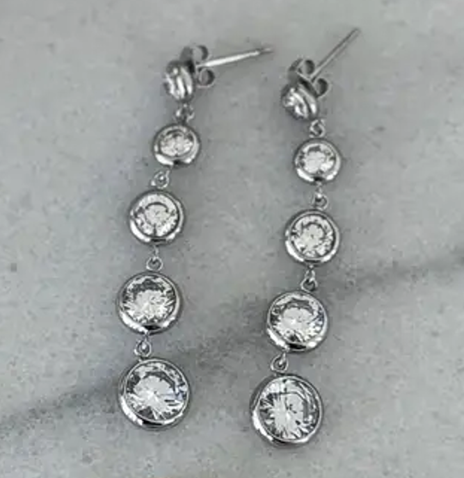 Polly silver crystal linear drop earrings by CHANSUTTPEARLS