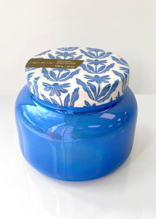 Blue jar with a patterned lid on a white background