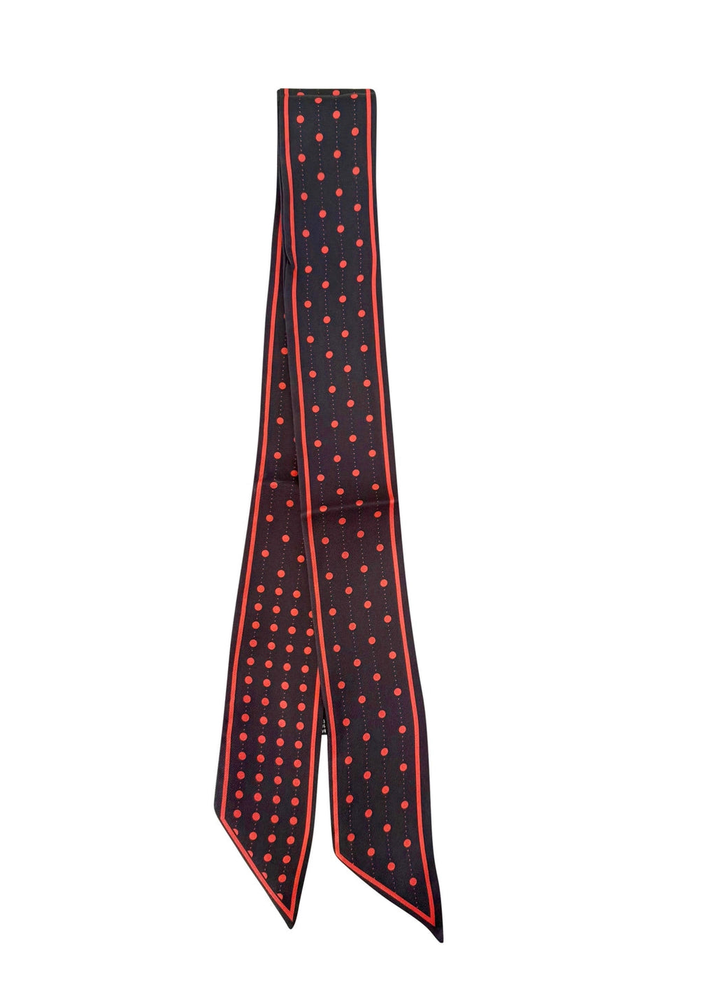 Black scarf with red polka dots on a white background