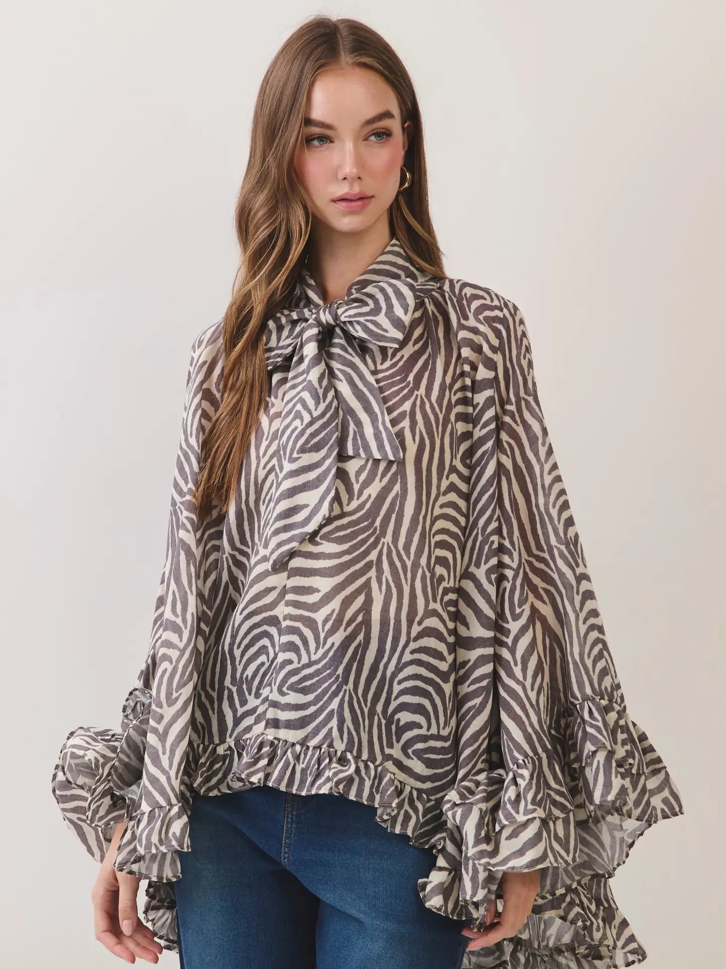Sadie Zebra Ruffle Blouse